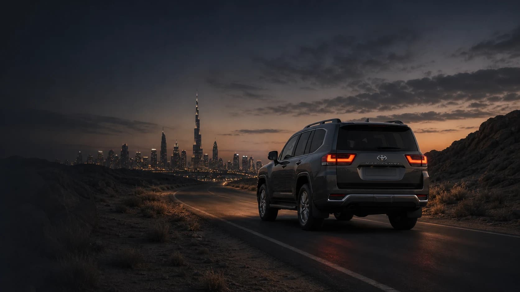 Toyota Land Cruiser driving toward Dubai at dusk